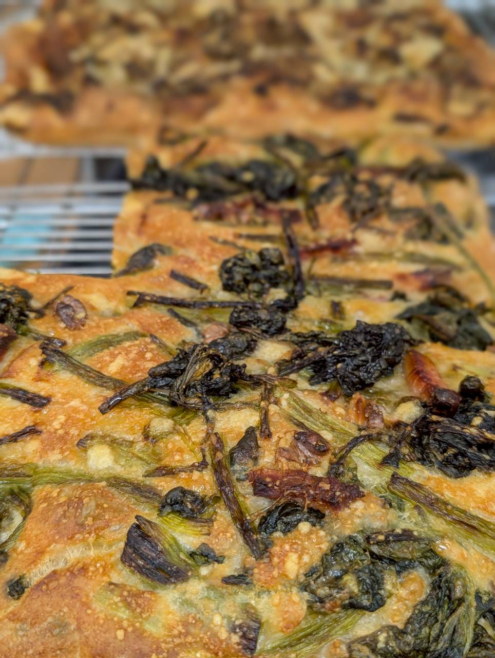 Wild spring greens and charred leek focaccia, handmade with Shinshu local vegetables — Focaccino Hakuba
